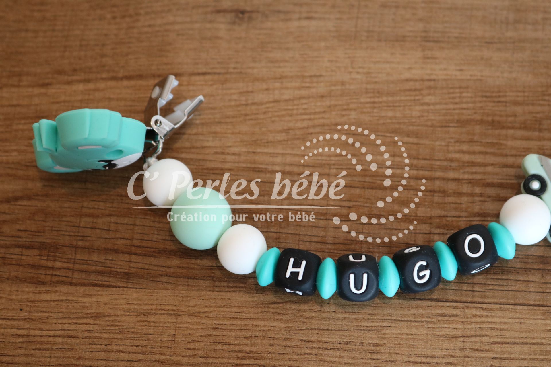 Attache tétine mixte