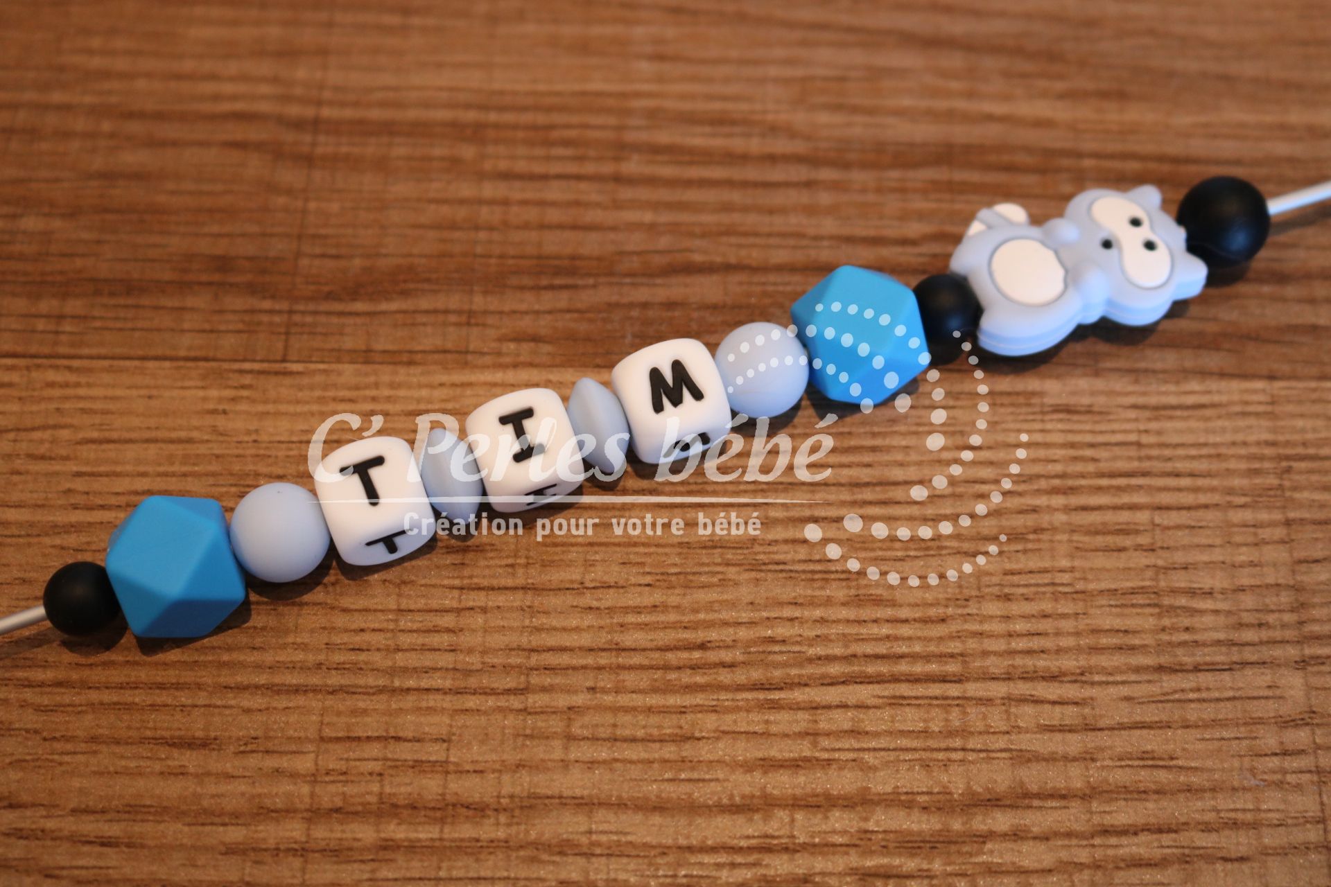 Attache sucette raton laveur Attache sucette raton laveur