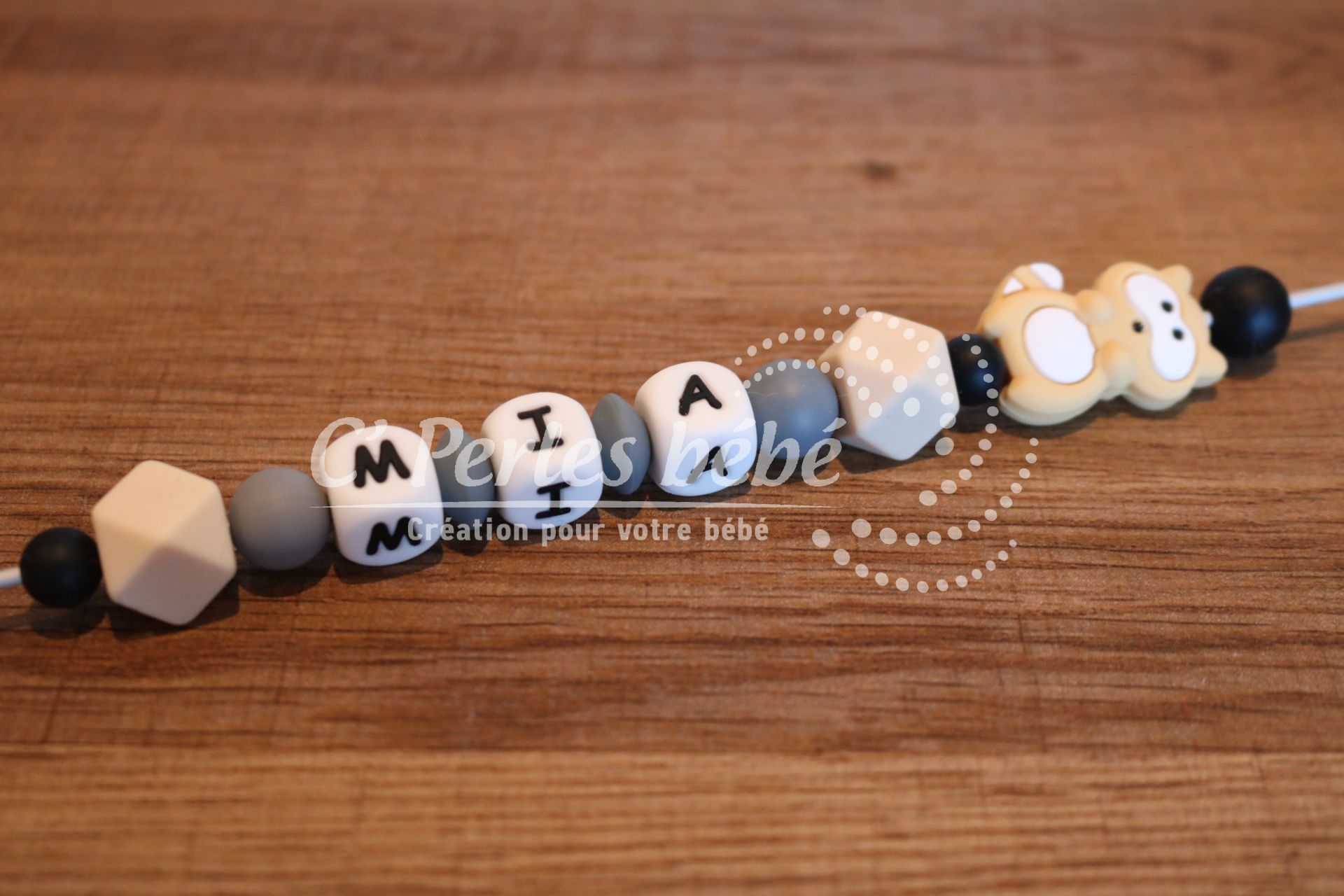 Attache sucette raton laveur Attache sucette raton laveur