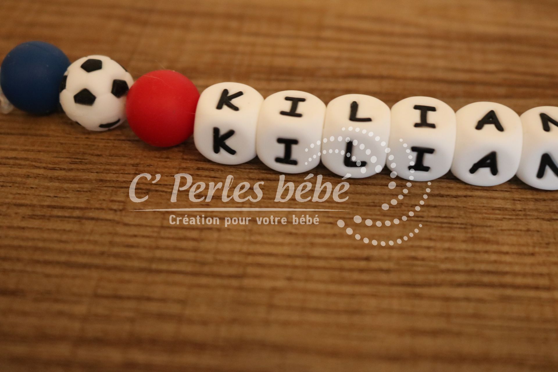 Attache tétine foot