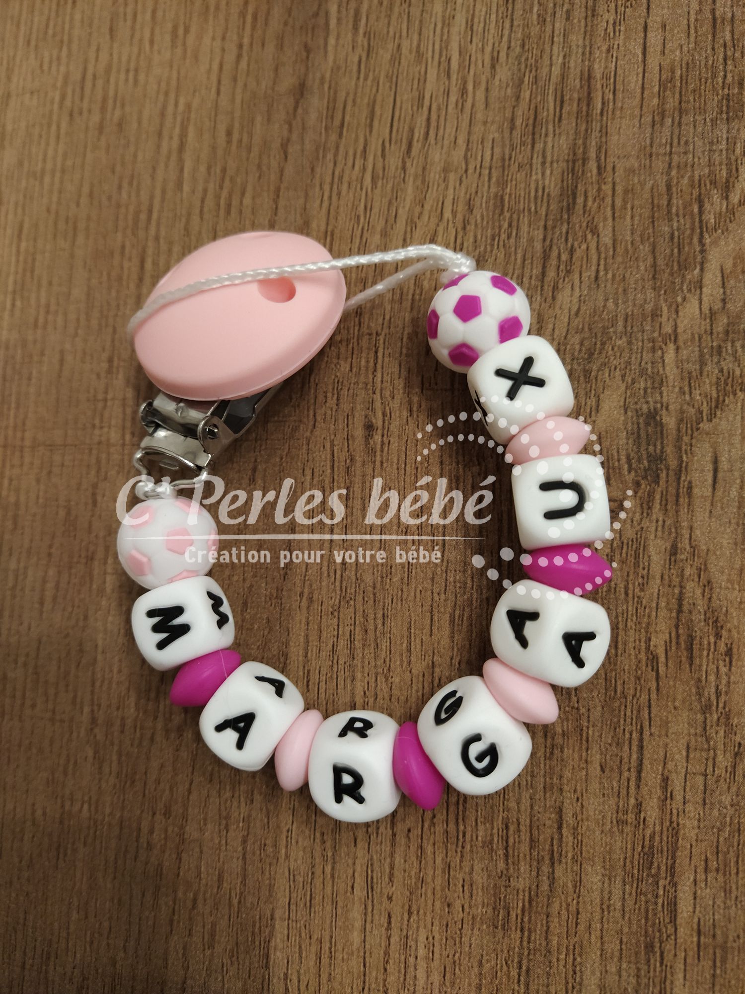 Attache sucette foot