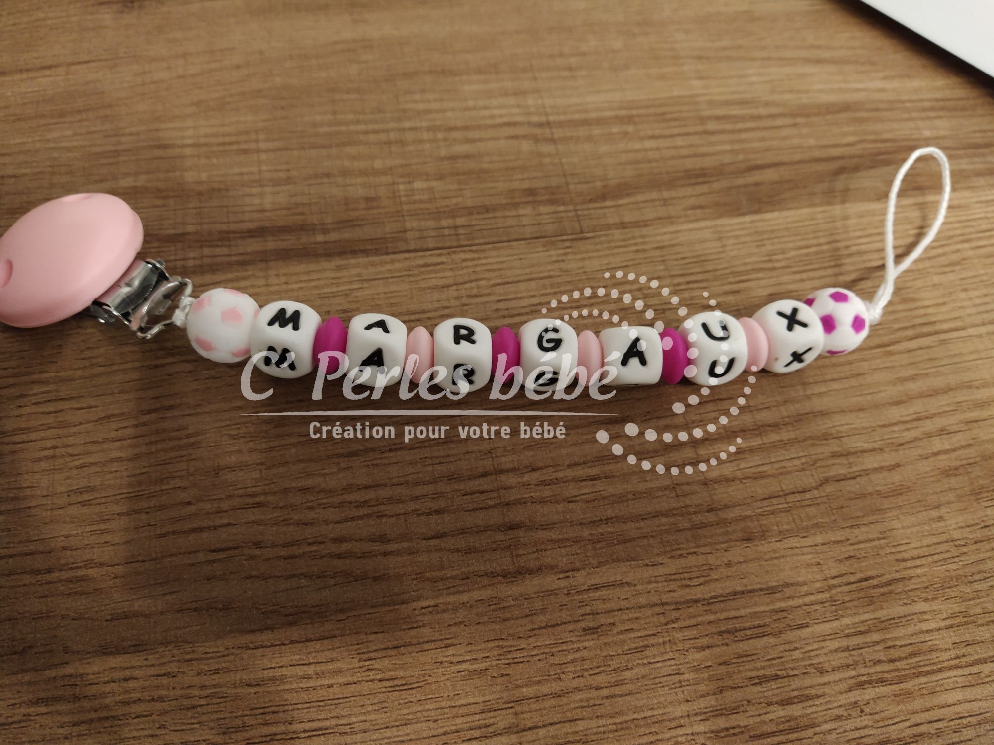 Attache sucette foot