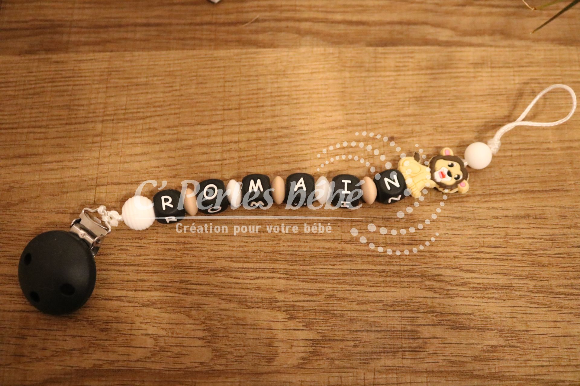 Attache tétine lion