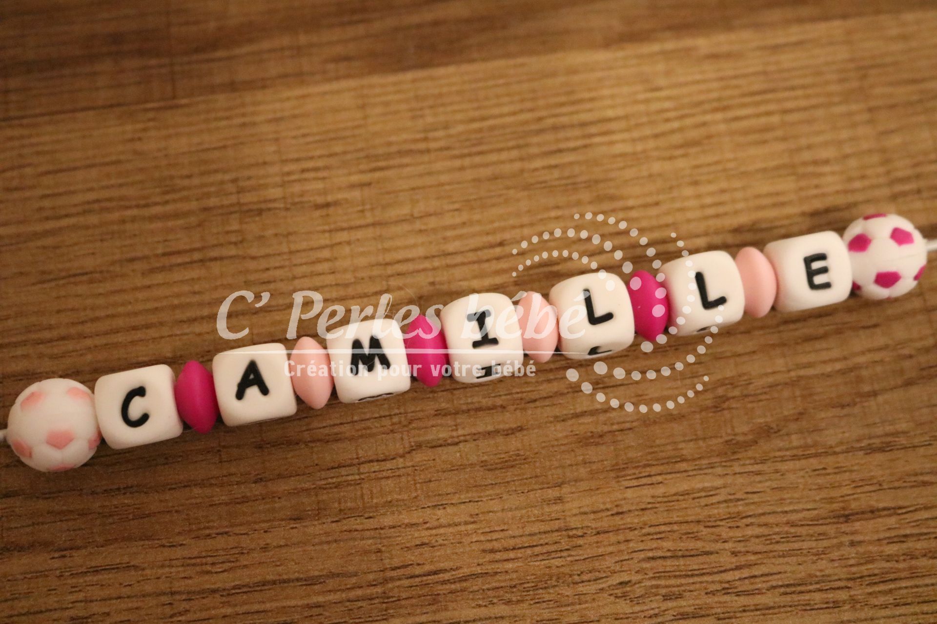 Attache tétine ballon