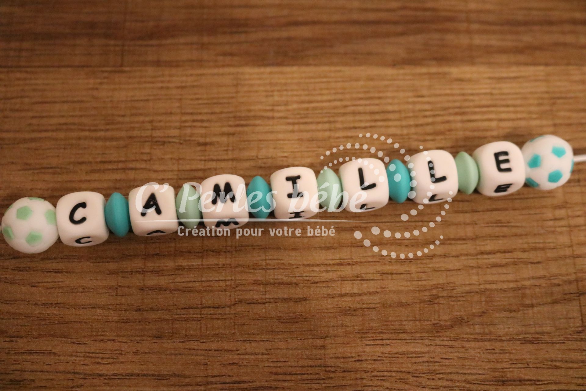 Attache tétine ballon