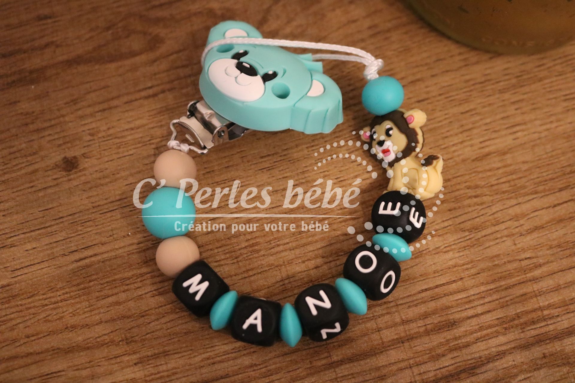 Attache sucette silicone lion