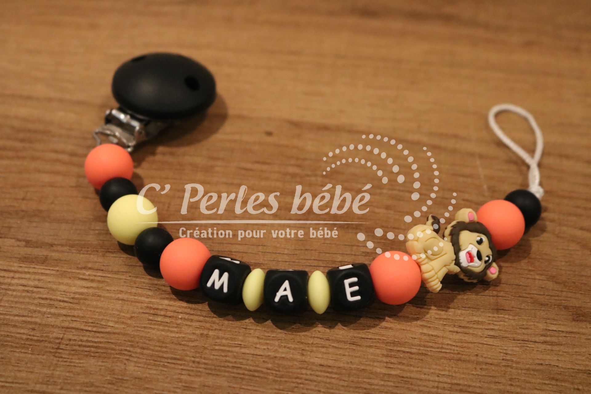 Attache sucette lion