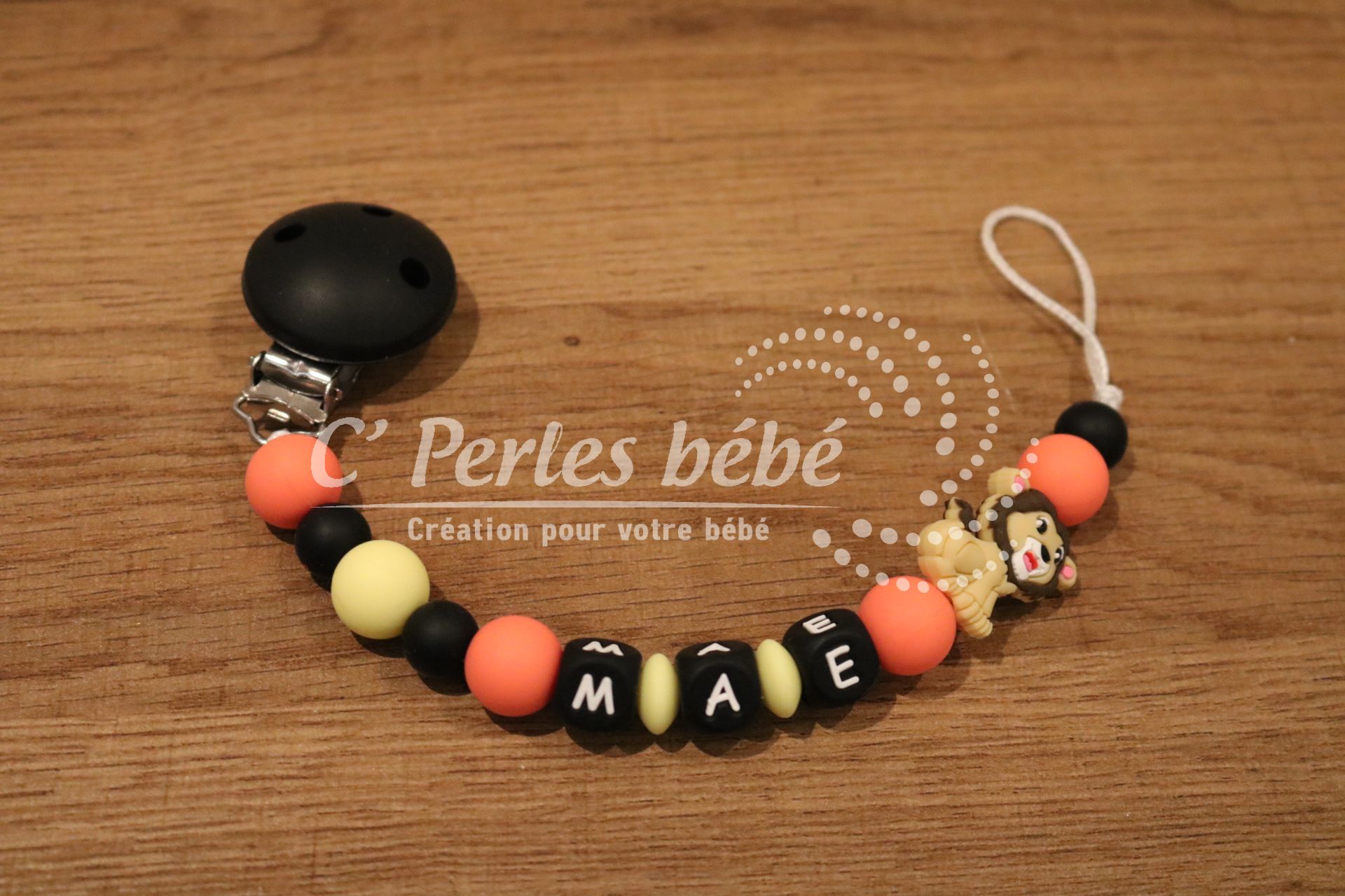 Attache sucette lion