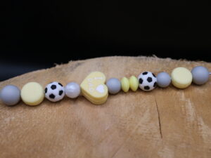 Attache tétine love foot